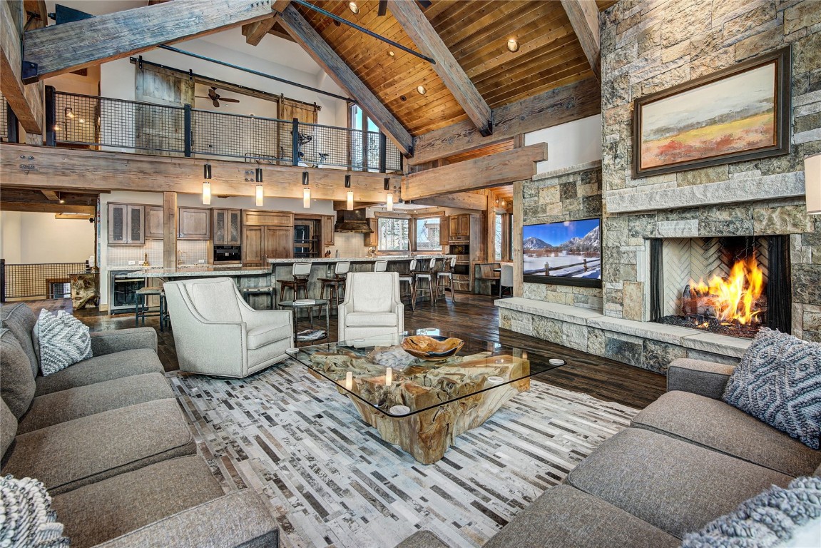 422 Timbertrail Road Breckenridge, CO 80424 - Photo 17 of 50 a living room with furniture and a fireplace