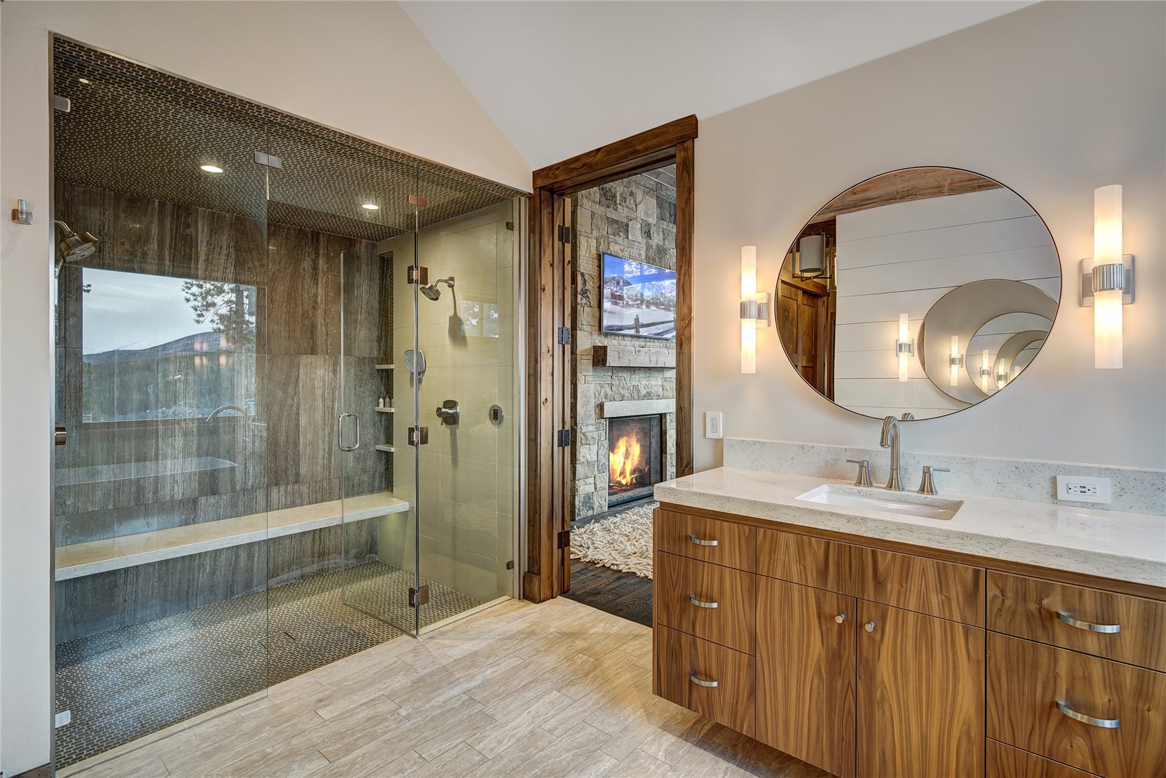 422 Timbertrail Road Breckenridge, CO 80424 - Photo 29 of 50 a spacious bathroom with a mirror sink and shower