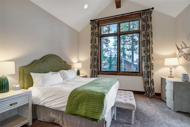 a kitchen with a table and chairs in it