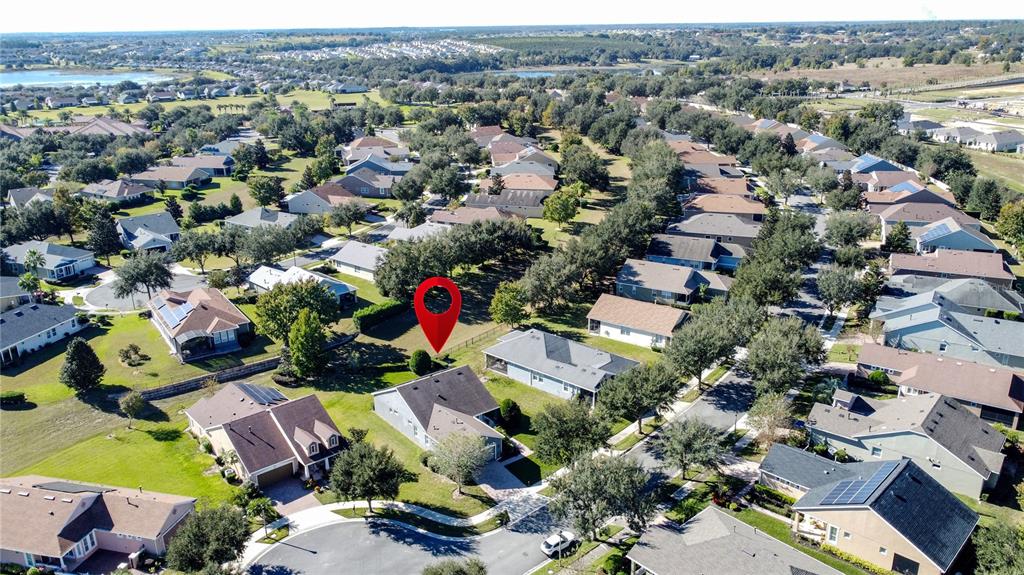 404 Silver Maple Road Groveland, FL 34736 - Photo 40 of 40 an aerial view of a houses with outdoor space