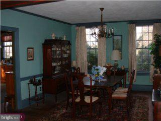 98 Quinton Alloway Road Quinton, NJ 08079 - Photo 5 of 6 a view of a dining room with furniture and chandelier