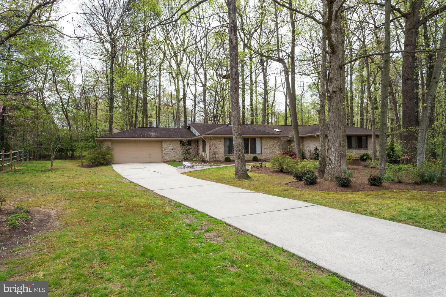 12348 Lima Lane Reston, VA 20191 - Photo 1 of 26 a view of a house with swimming pool and sitting area