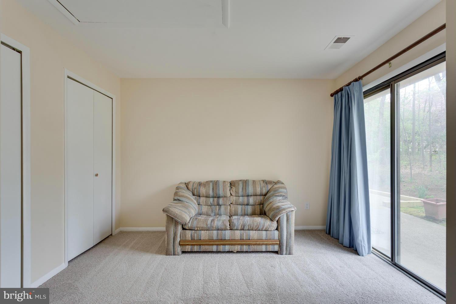 12348 Lima Lane Reston, VA 20191 - Photo 18 of 26 a living room with furniture and a window