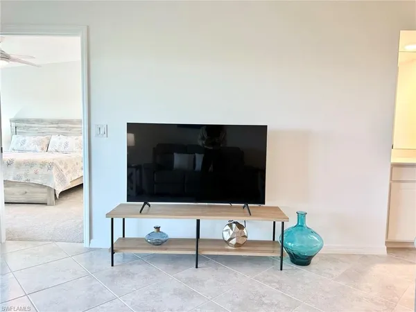 a view of a chairs and table in the patio