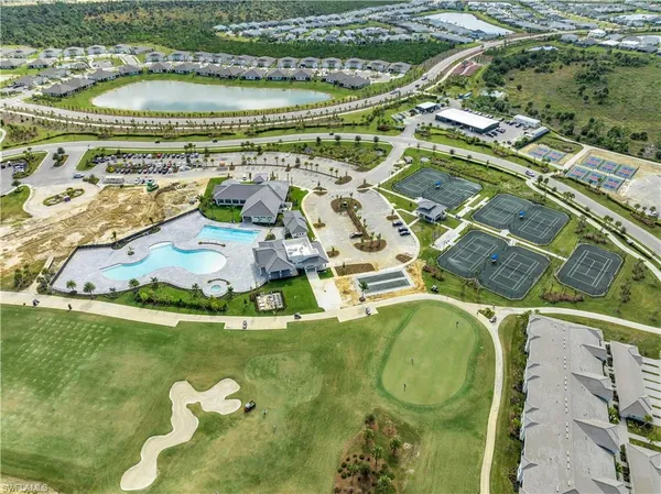 a view of kitchen with furniture and wooden floor