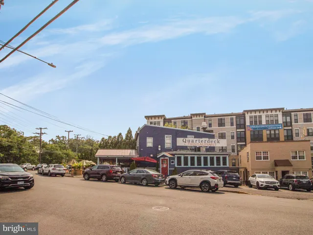 a view of a street with cars