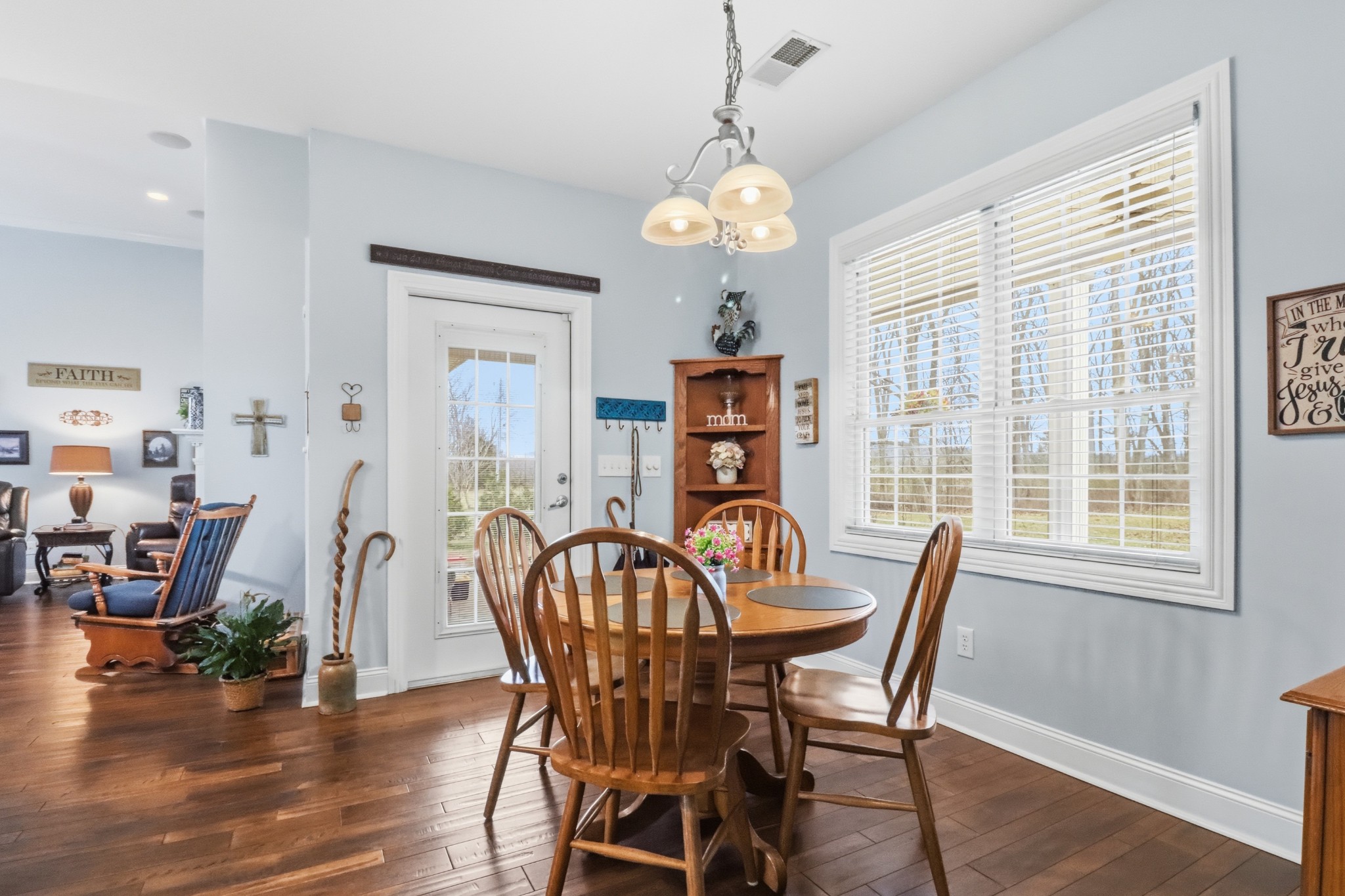3287 Bluebird Road Lebanon, TN 37087 - Photo 12 of 64 a view of a dining room with furniture wooden floor and chandelier