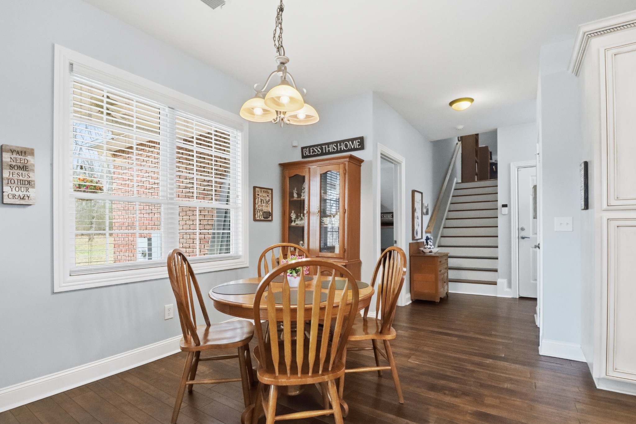 3287 Bluebird Road Lebanon, TN 37087 - Photo 14 of 64 a view of a dining room with furniture window and wooden floor