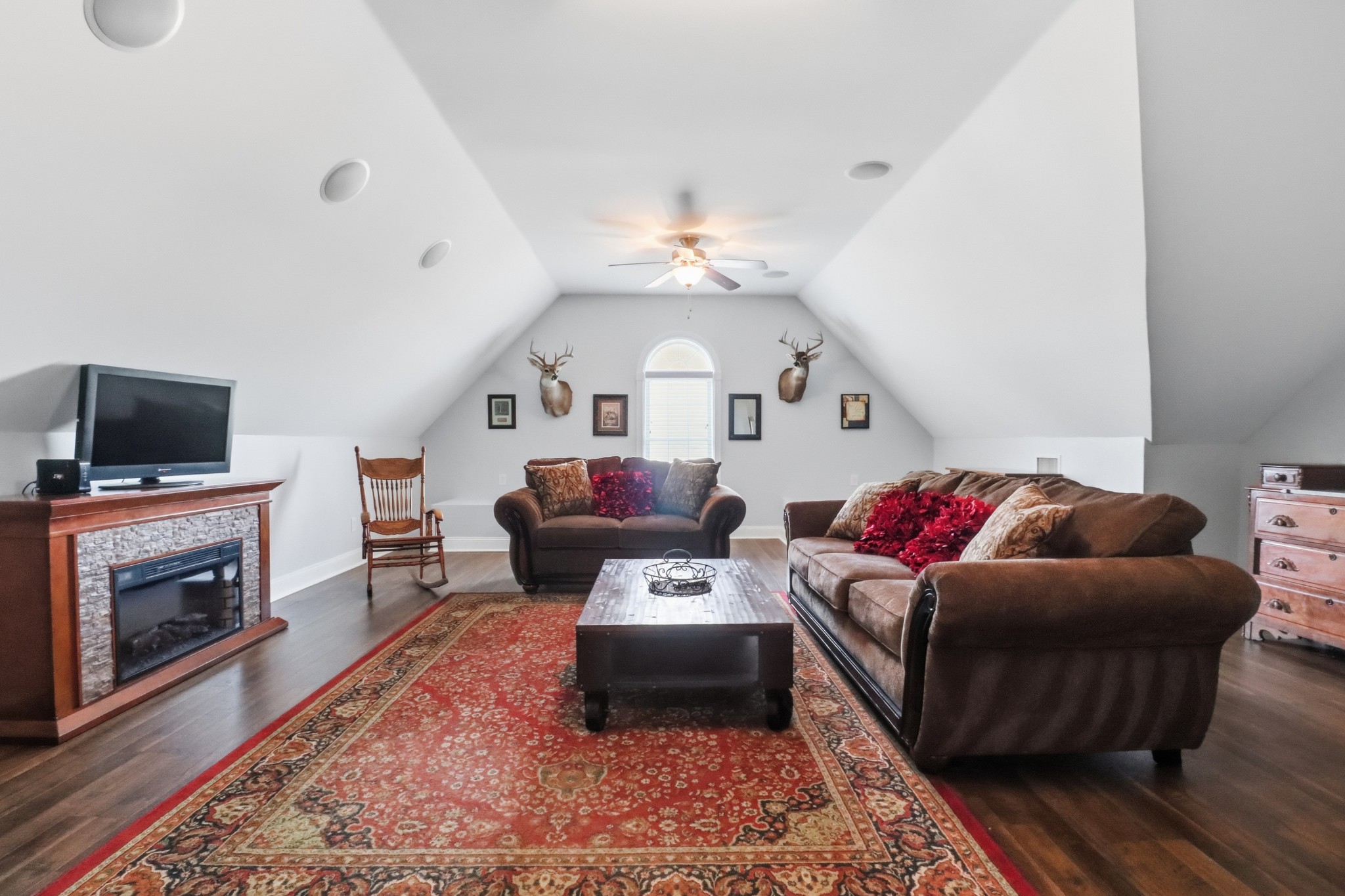 3287 Bluebird Road Lebanon, TN 37087 - Photo 15 of 64 a living room with furniture a flat screen tv and a fireplace