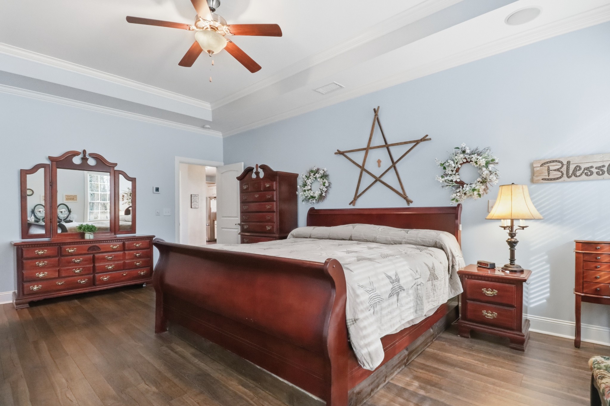 3287 Bluebird Road Lebanon, TN 37087 - Photo 18 of 64 a bedroom with a bed and wooden floor