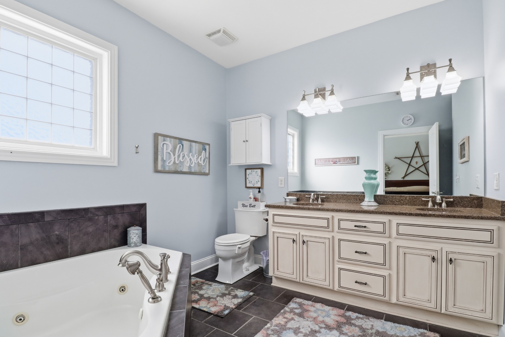 3287 Bluebird Road Lebanon, TN 37087 - Photo 20 of 64 a spacious en suite bathroom with a granite countertop tub and 2 sink