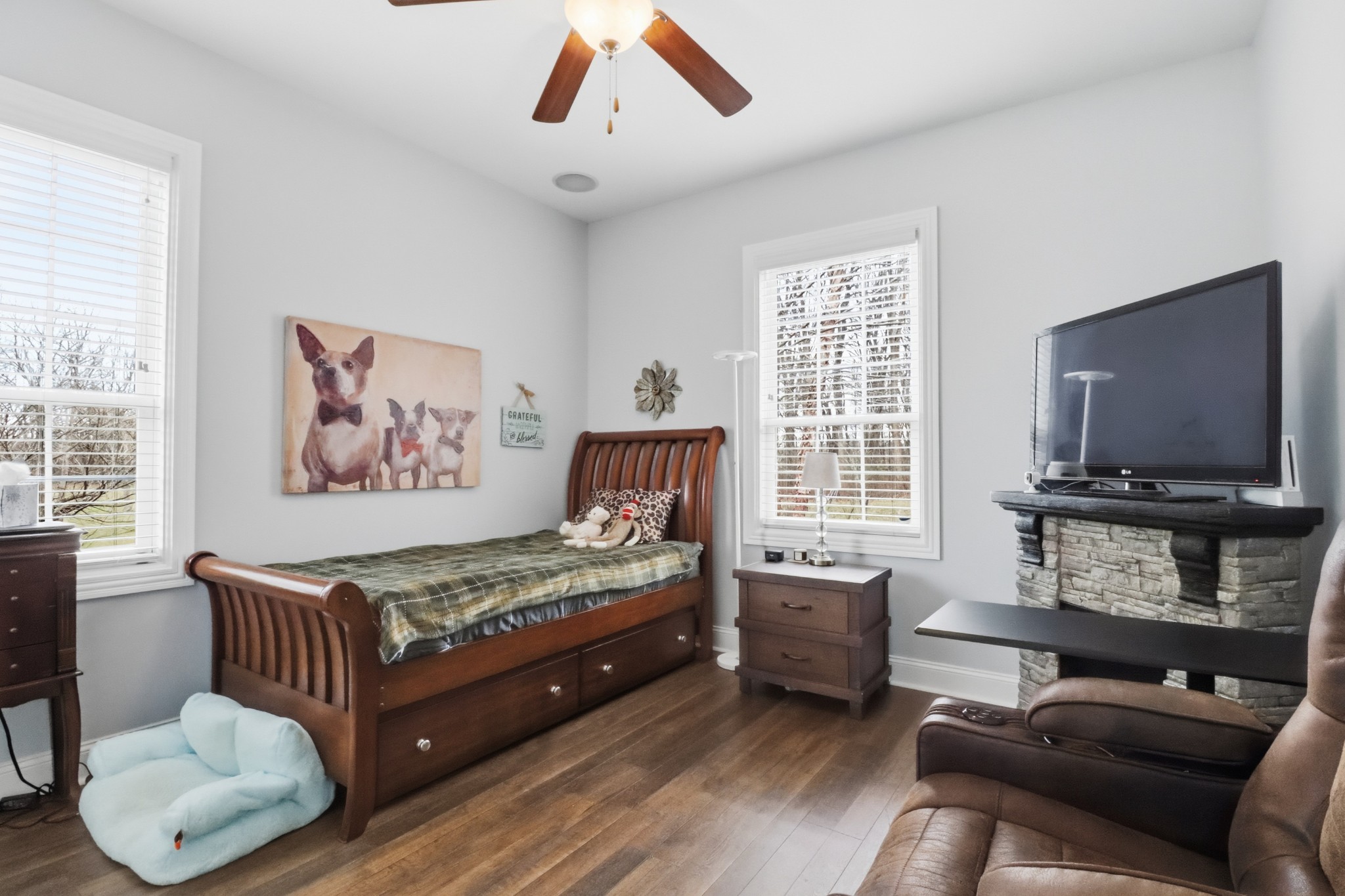 3287 Bluebird Road Lebanon, TN 37087 - Photo 23 of 64 a living room with furniture and a flat screen tv