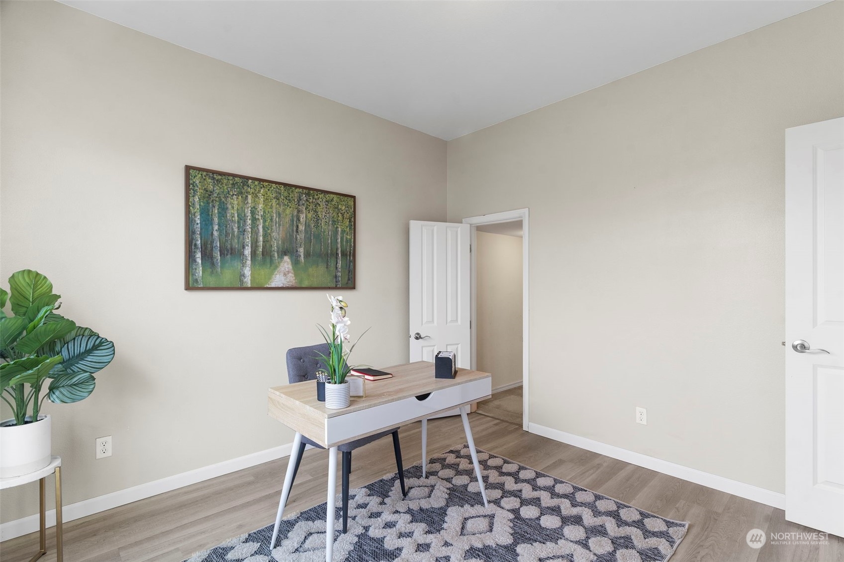 9175 Periwinkle Loop Northeast Lacey, WA 98516 - Photo 11 of 29 a workspace with furniture and wooden floor