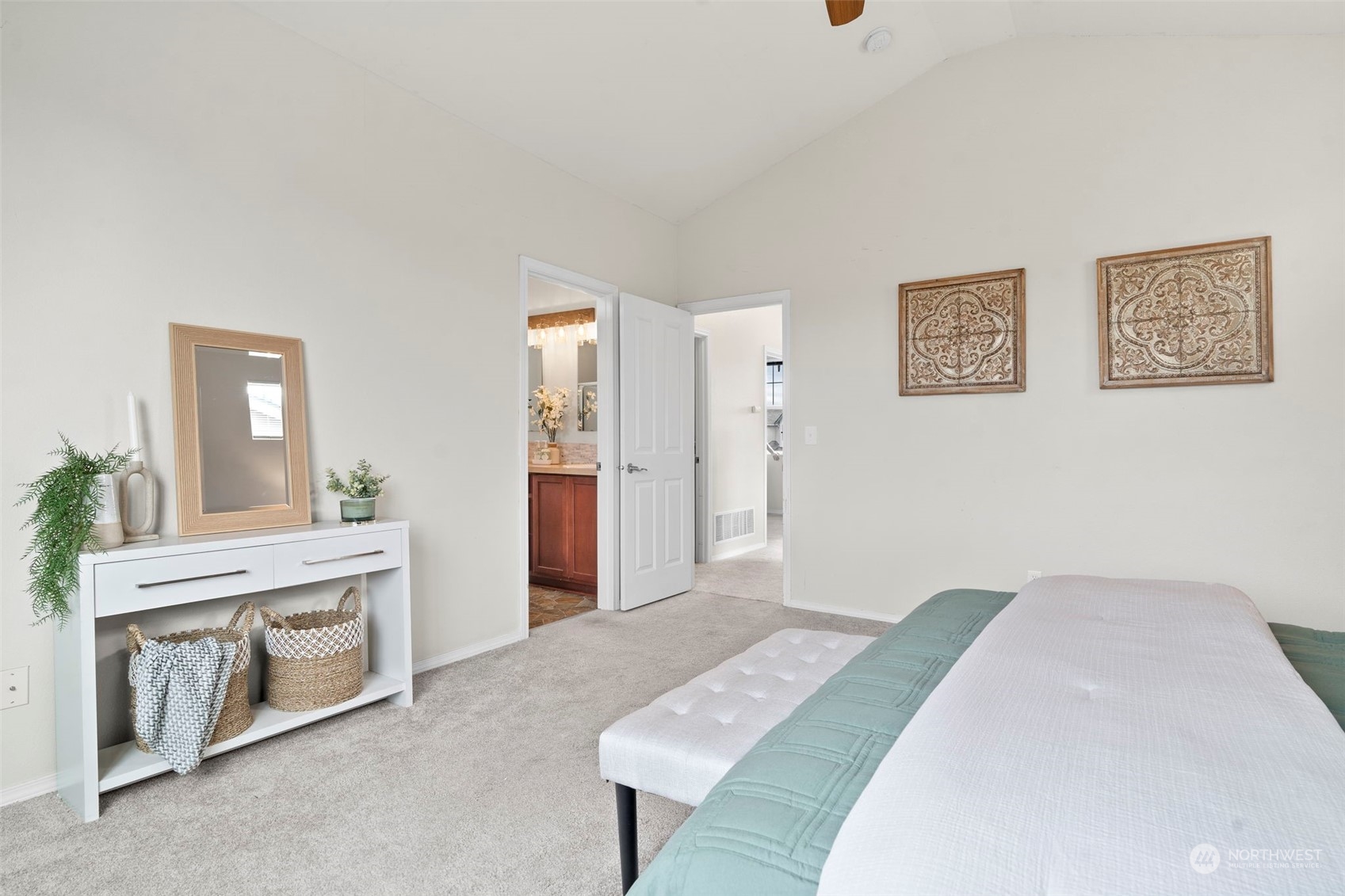 9175 Periwinkle Loop Northeast Lacey, WA 98516 - Photo 13 of 29 a bedroom with a bed and a cabinets