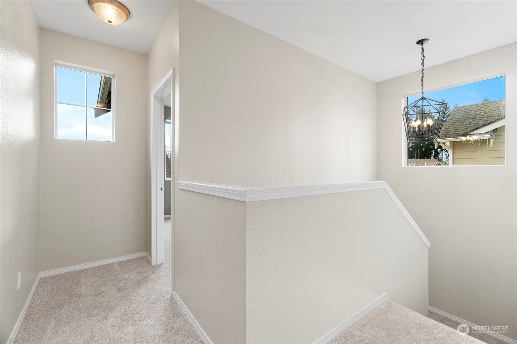 9175 Periwinkle Loop Northeast Lacey, WA 98516 - Photo 18 of 29 a view of an empty room with a window