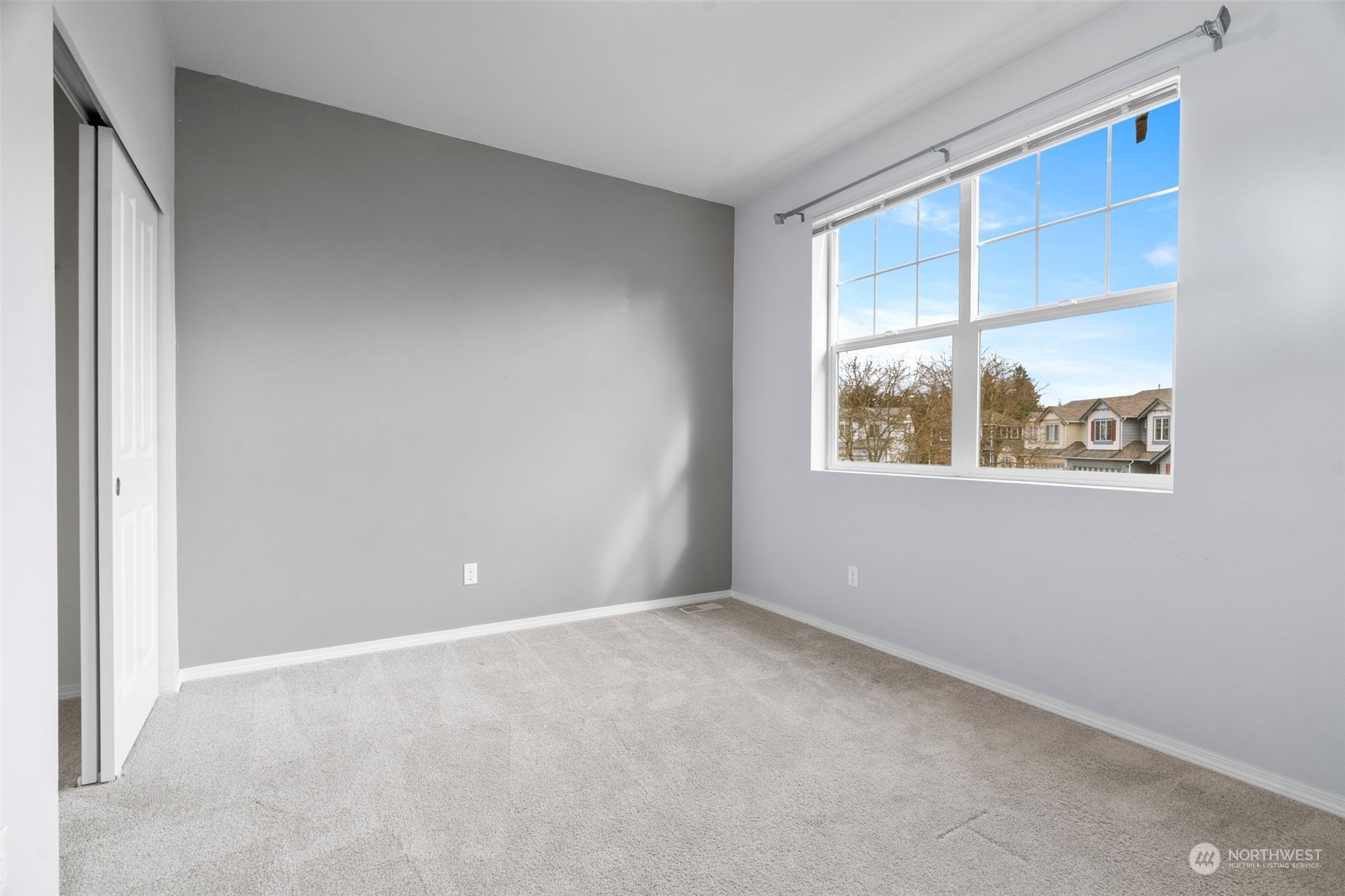 9175 Periwinkle Loop Northeast Lacey, WA 98516 - Photo 21 of 29 a view of an empty room with a window