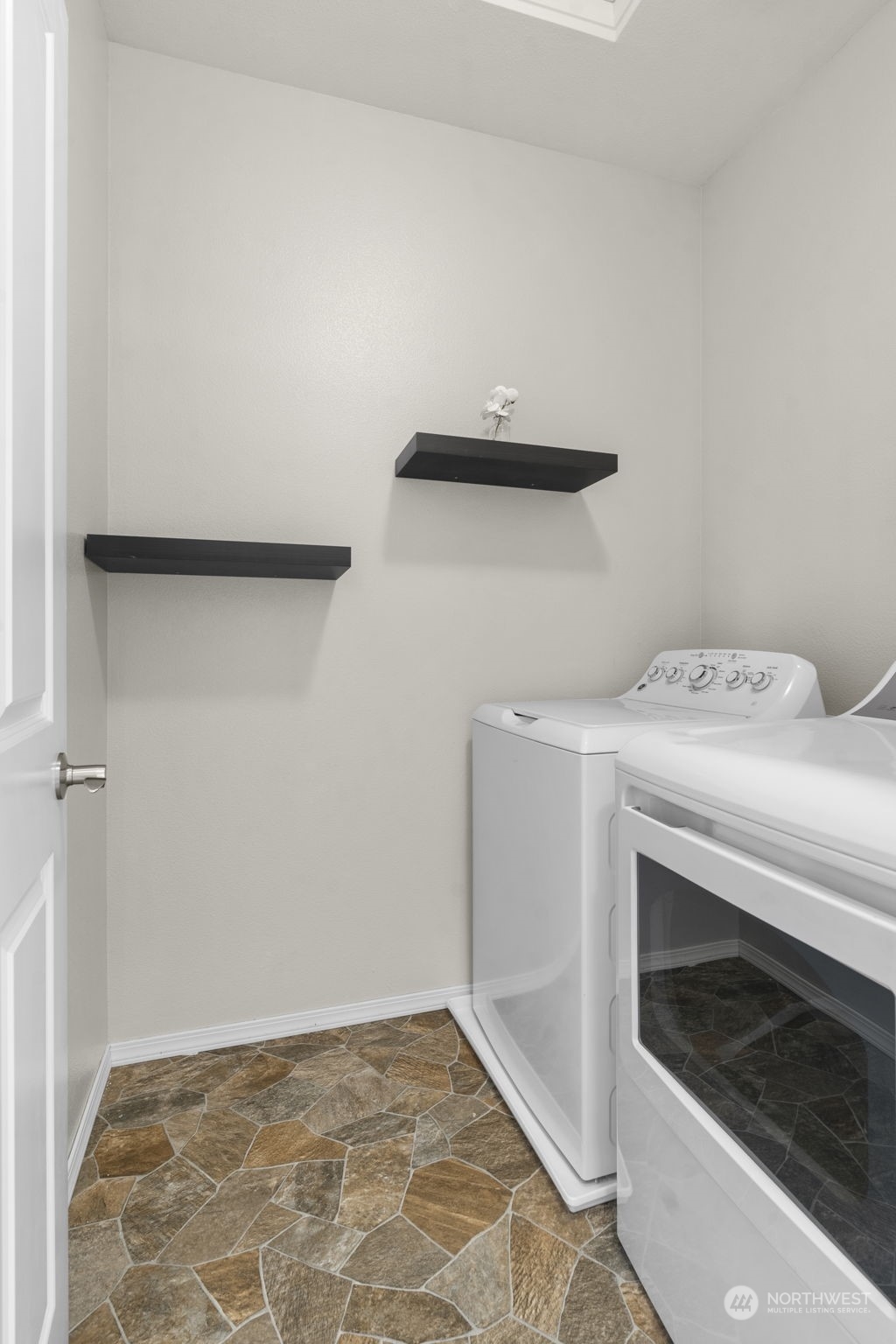 9175 Periwinkle Loop Northeast Lacey, WA 98516 - Photo 22 of 29 a utility room with dryer and washer