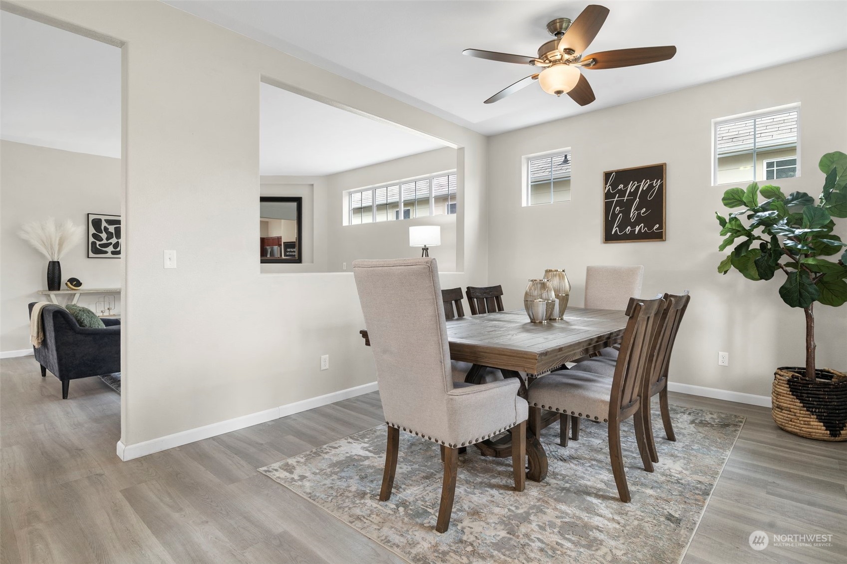 9175 Periwinkle Loop Northeast Lacey, WA 98516 - Photo 3 of 29 a view of a dining room with furniture