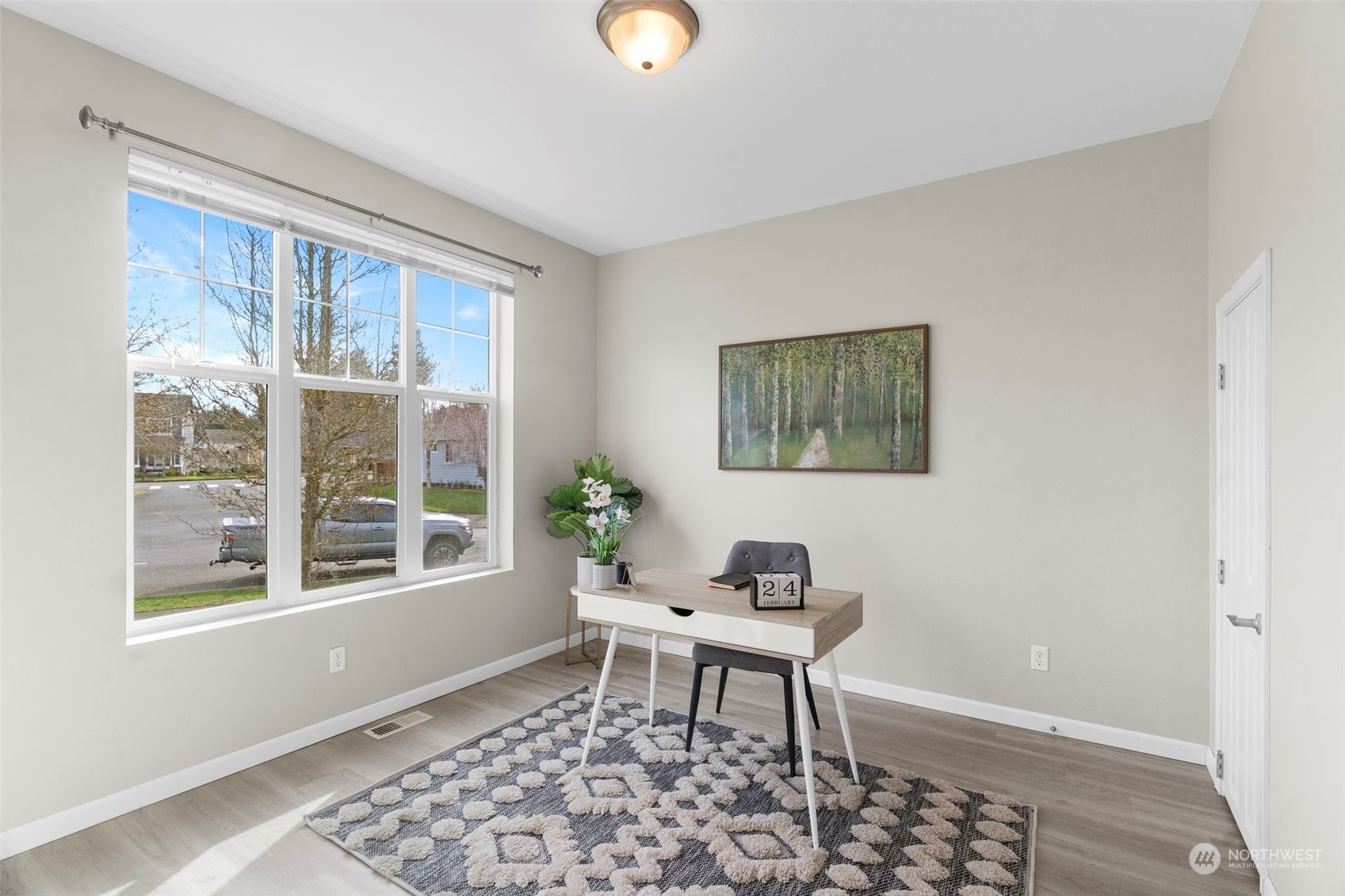 9175 Periwinkle Loop Northeast Lacey, WA 98516 - Photo 10 of 29 a workspace with furniture and a window