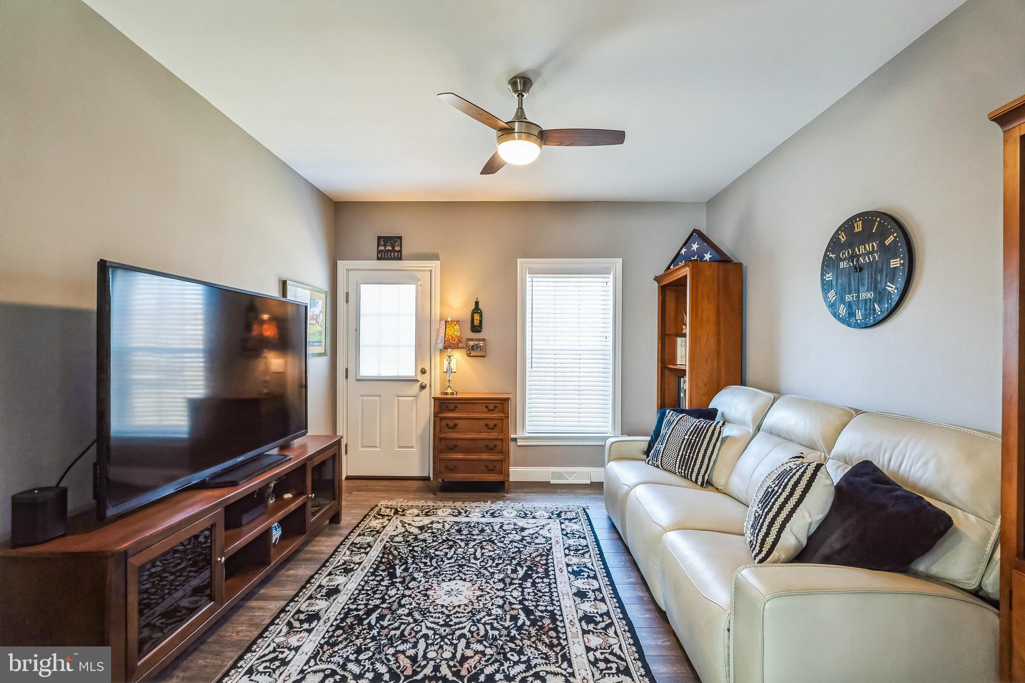 425 Azalea Drive Blue Bell, PA 19422 - Photo 12 of 26 a living room with furniture and a flat screen tv