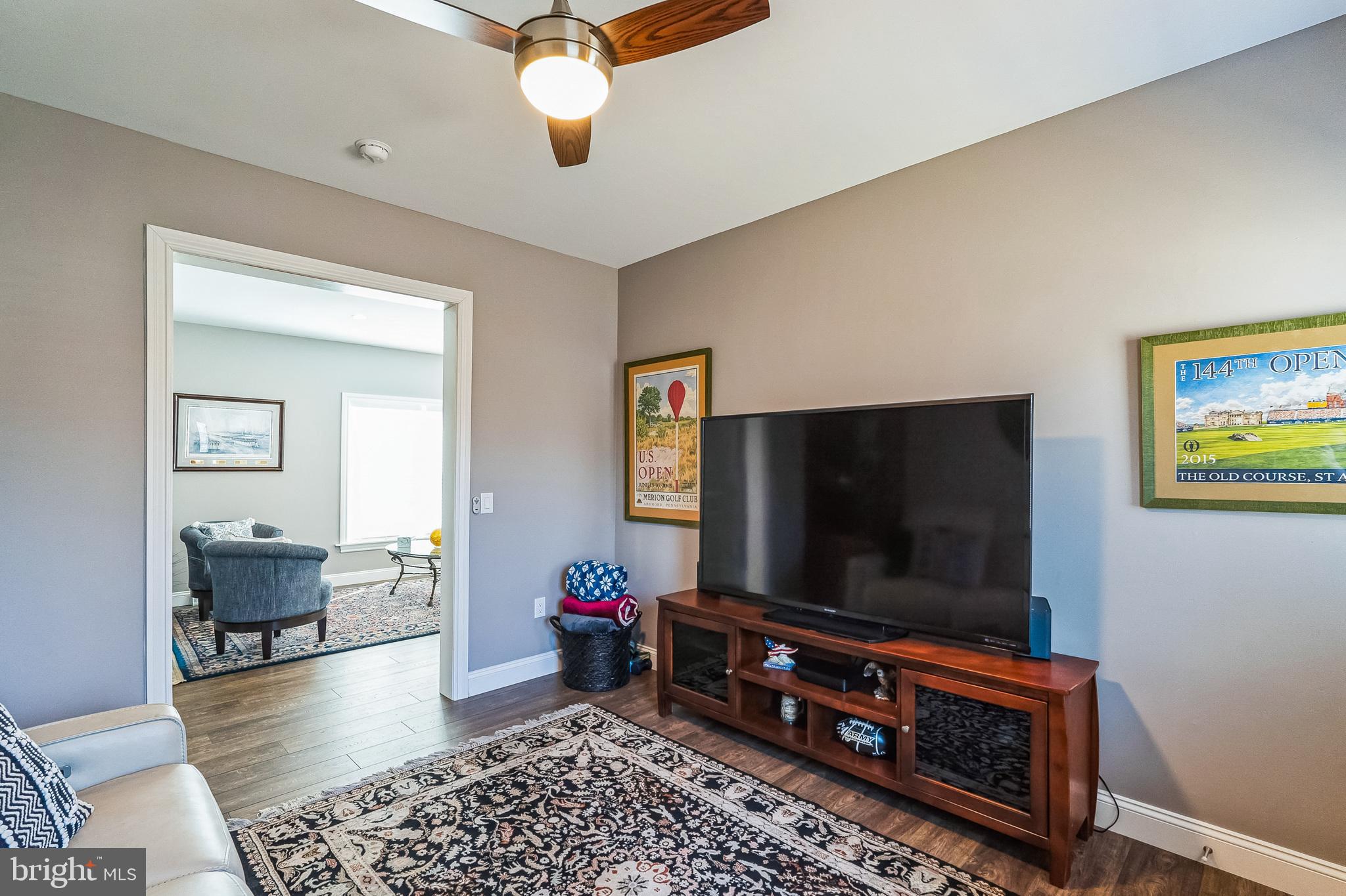 425 Azalea Drive Blue Bell, PA 19422 - Photo 13 of 26 a living room with furniture and a flat screen tv