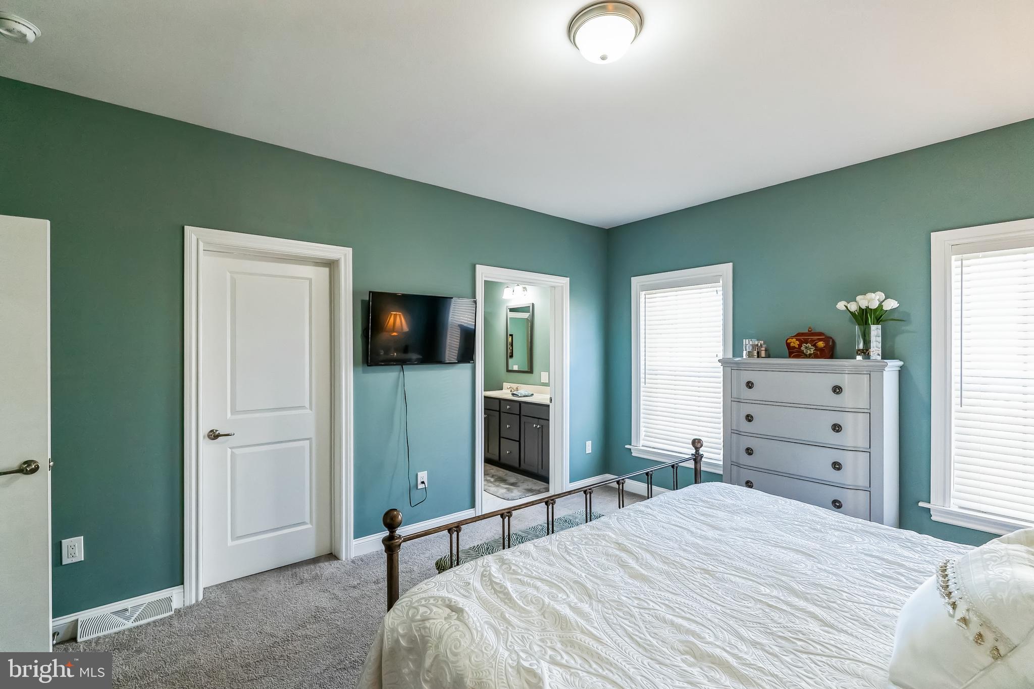 425 Azalea Drive Blue Bell, PA 19422 - Photo 16 of 26 a bedroom with a bed and furniture