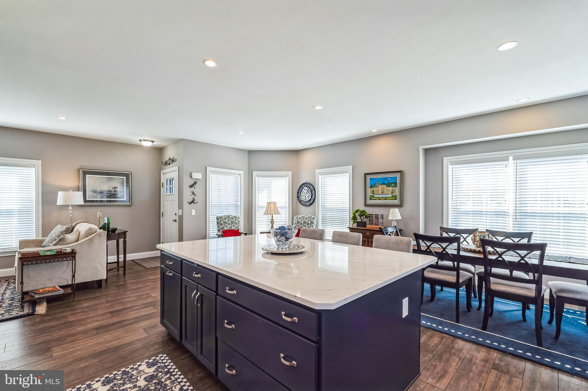 425 Azalea Drive Blue Bell, PA 19422 - Photo 4 of 26 a large kitchen with kitchen island a sink table and chairs