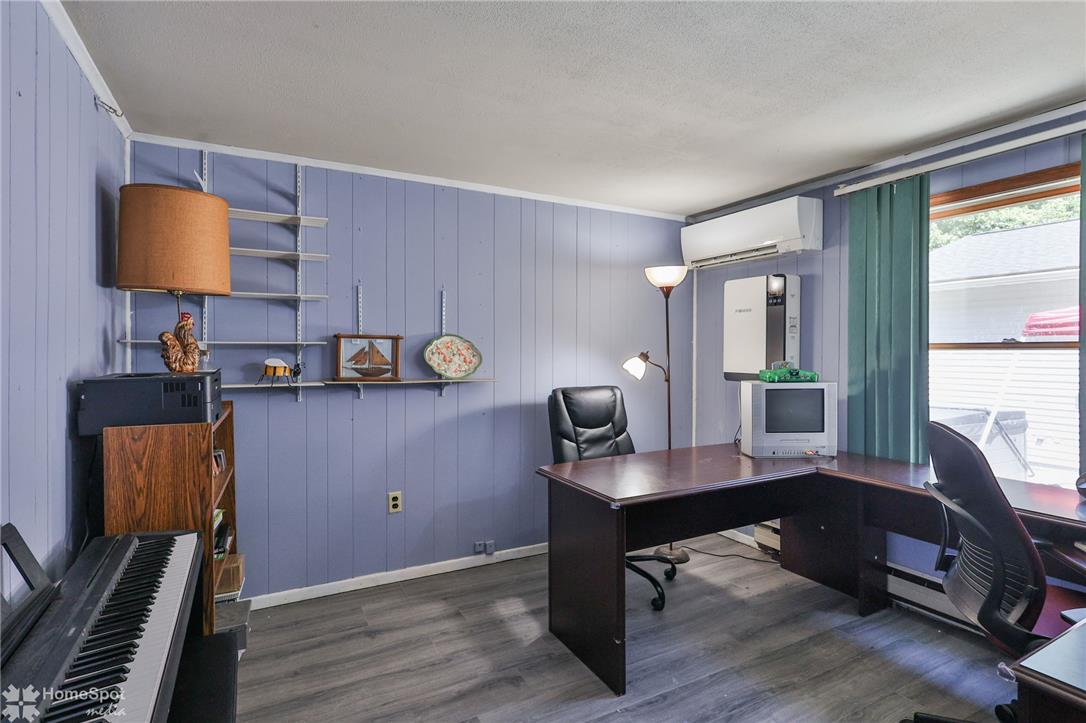 60 Sassafras Road Lehighton, PA 18235 - Photo 31 of 36 A versatile home office area offers dedicated workspace and shelving for organized storage.