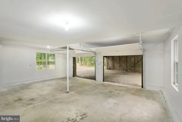 an empty room with windows