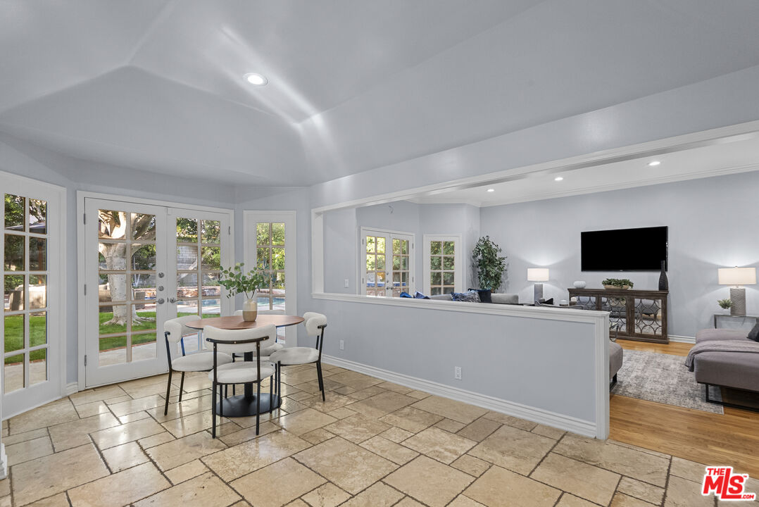 18779 Willowtree Lane Porter Ranch, CA 91326 - Photo 13 of 63 a view of a livingroom with furniture and a flat screen tv