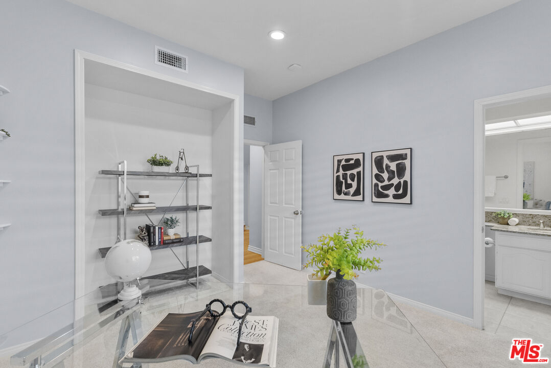 18779 Willowtree Lane Porter Ranch, CA 91326 - Photo 29 of 63 a living room with furniture and decor