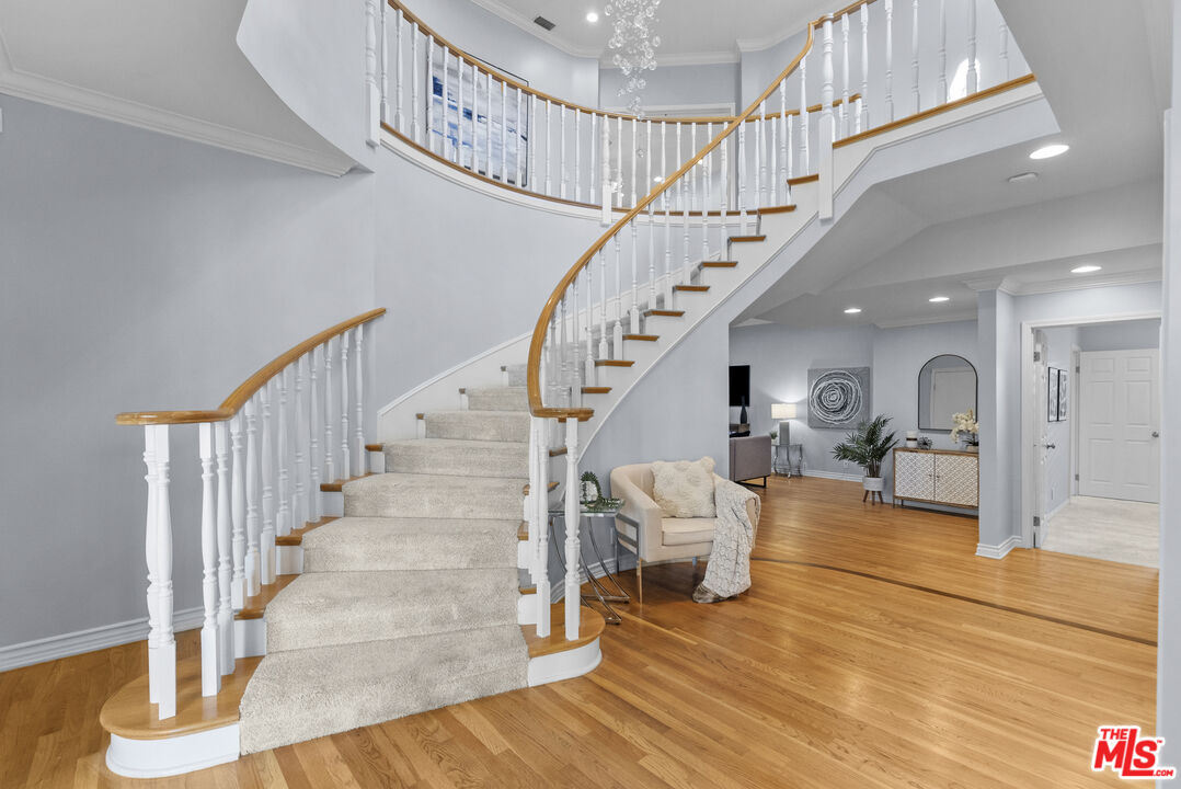 18779 Willowtree Lane Porter Ranch, CA 91326 - Photo 4 of 63 a view of entryway and hall with wooden floor