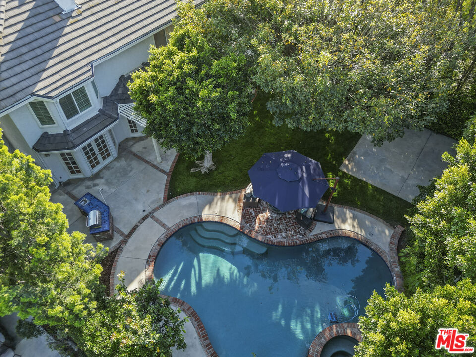 18779 Willowtree Lane Porter Ranch, CA 91326 - Photo 63 of 63 an aerial view of a house with yard basket ball court and outdoor seating