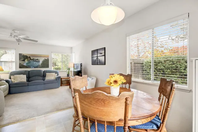 a view of a chairs and table in the patio