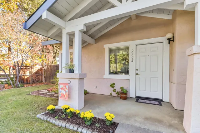 a kitchen with cabinets appliances a sink and a counter top space