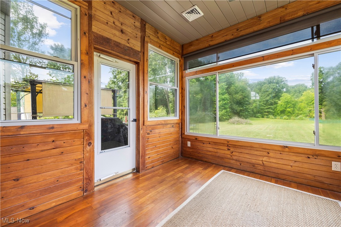177 Mishler Road Mogadore, OH 44260 - Photo 20 of 50 Three season room with great view of backyard and pool area also has access to deck
