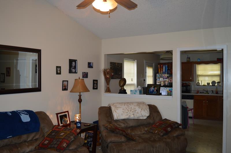 2811 Rome Lane Clarksville, TN 37040 - Photo 2 of 10 a living room with furniture and a chandelier