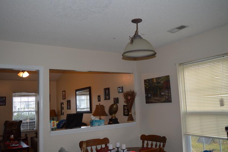 2811 Rome Lane Clarksville, TN 37040 - Photo 5 of 10 a view of a livingroom with furniture window and a ceiling fan