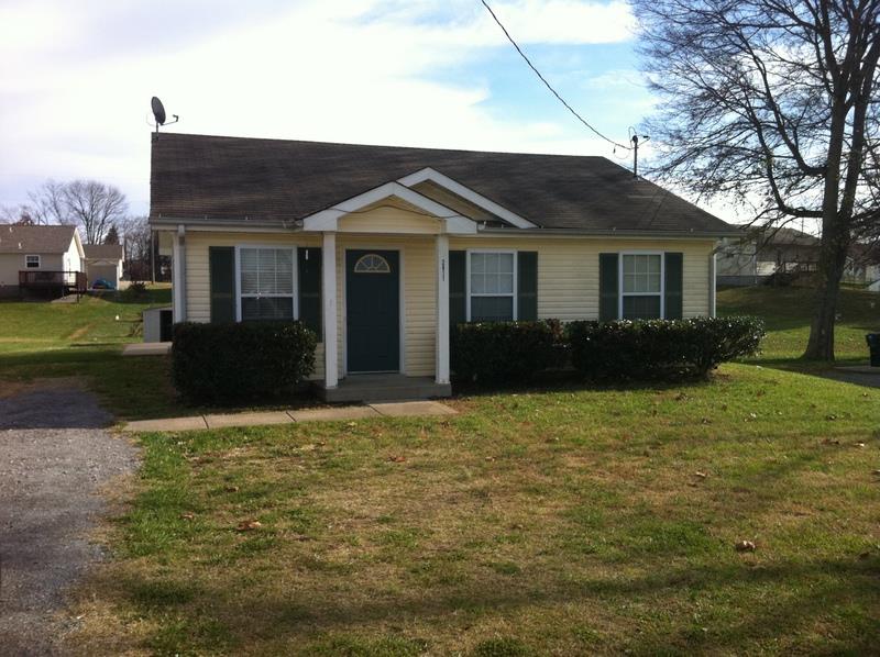 2811 Rome Lane Clarksville, TN 37040 - Photo 8 of 10 a front view of a house with garden