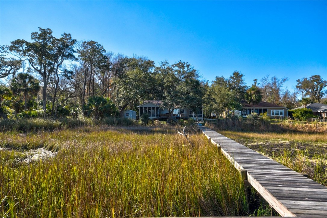97260 Pirates Point Road Yulee, FL 32097 - Photo 23 of 23 a view of a lake with houses