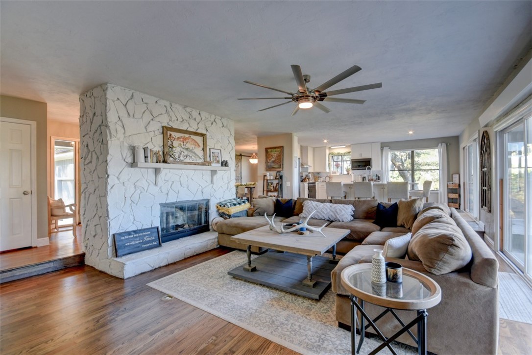 97260 Pirates Point Road Yulee, FL 32097 - Photo 7 of 23 a living room with furniture and a fireplace