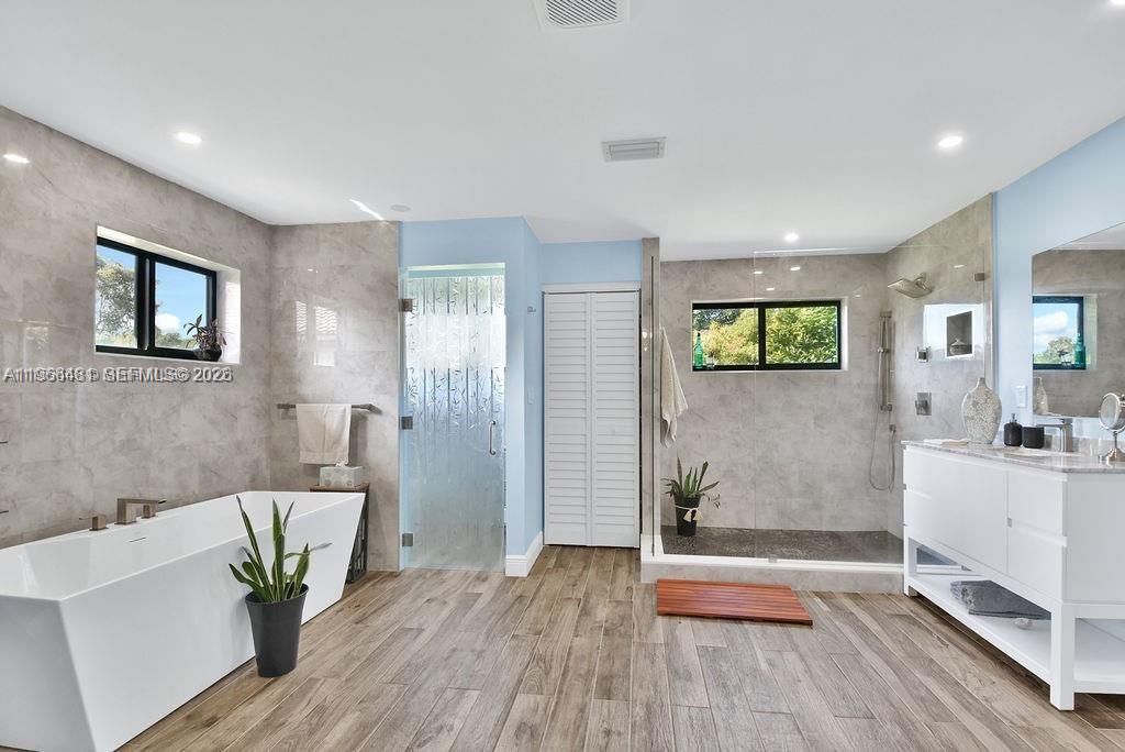 5425 Southwest 190th Avenue, Unit 1 Southwest Ranches, FL 33332 - Photo 23 of 56 a living room with furniture and wooden floor