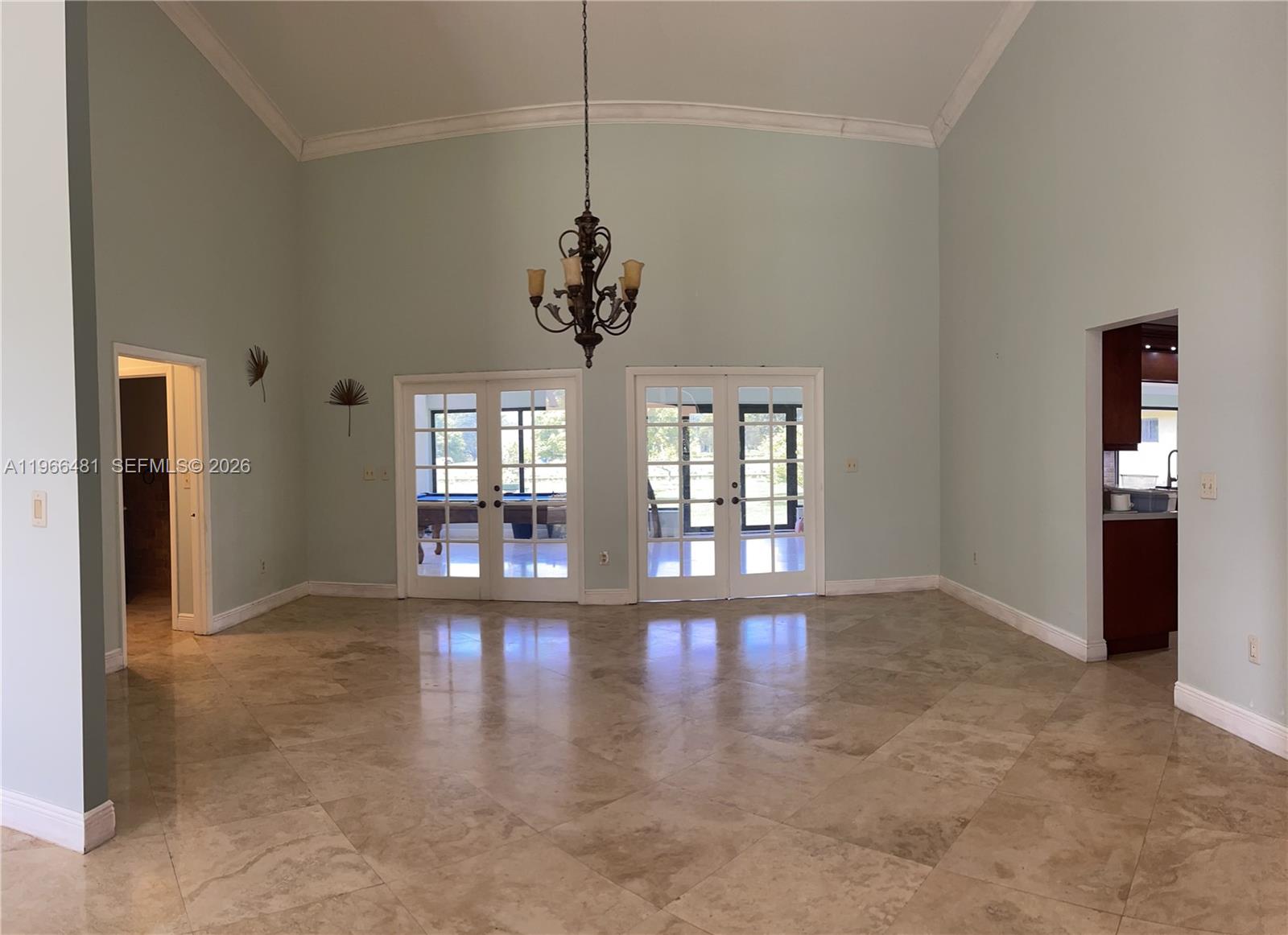 5425 Southwest 190th Avenue, Unit 1 Southwest Ranches, FL 33332 - Photo 25 of 56 a view of an empty room with wooden floor and a window