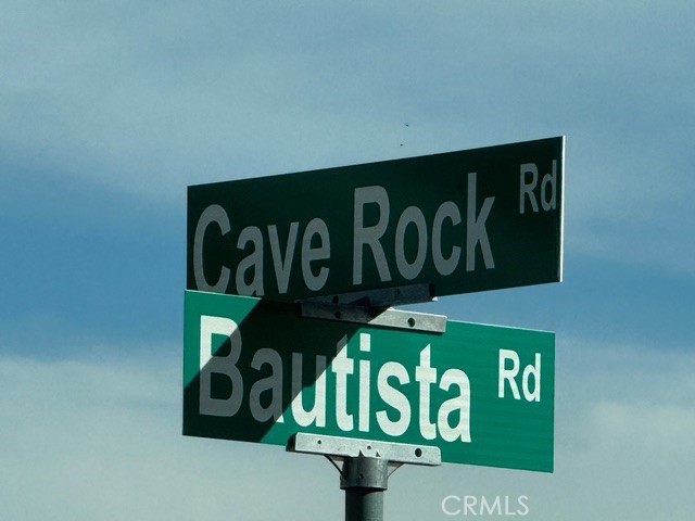 54740 Cave Rock Road Anza, CA 92539 - Photo 6 of 47 a close up of a street sign