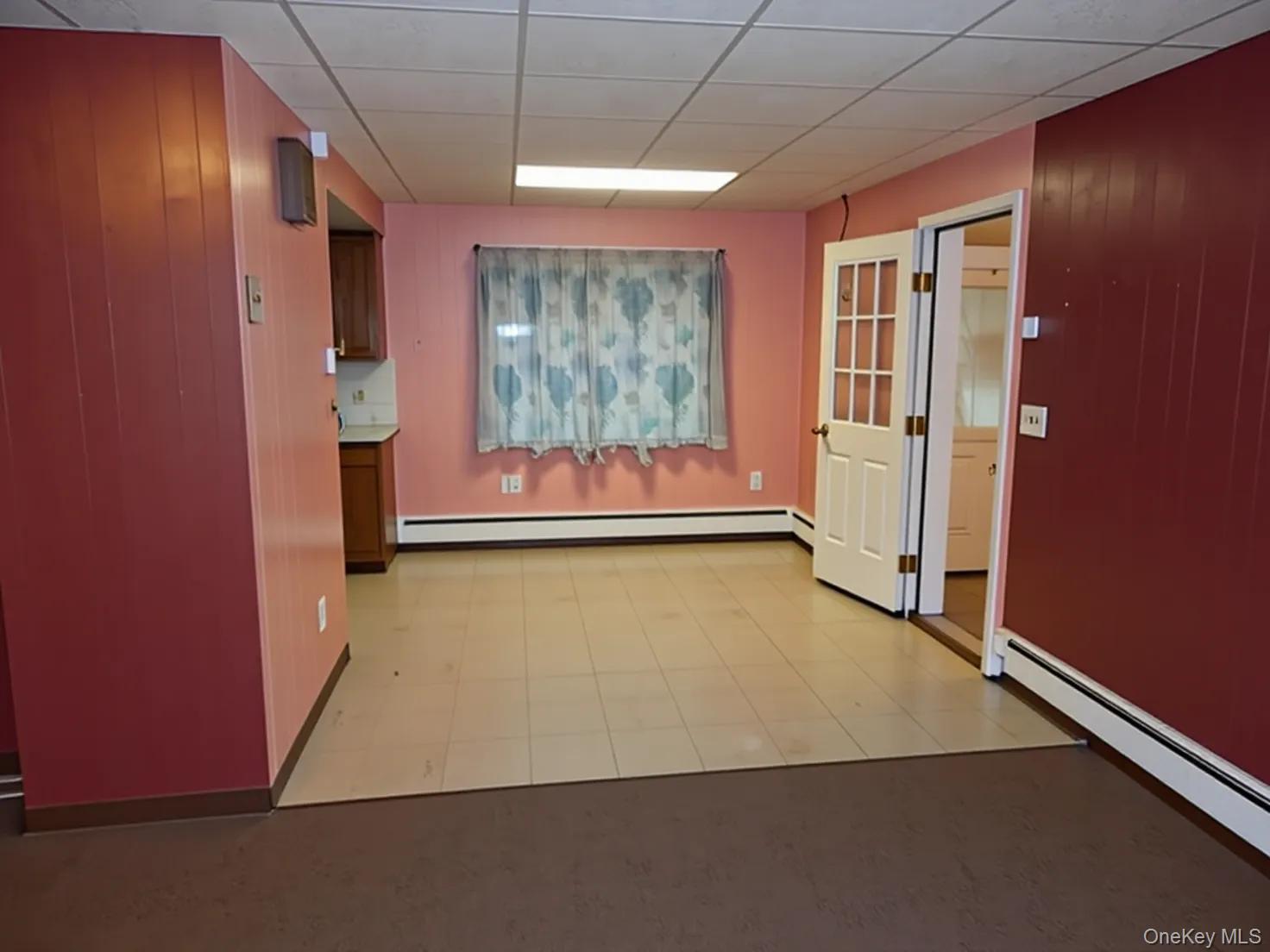 276 Old Rte 22 Wassaic, NY 12592 - Photo 5 of 23 an empty room with wooden floor and windows