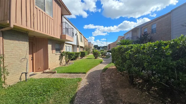 a view of a house with a garden