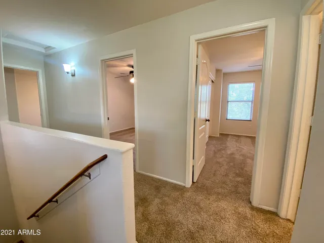 a view of a hallway with closet