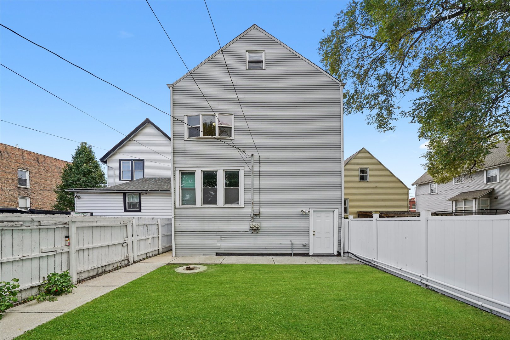5108 West 24th Place, Unit 2 Cicero, IL 60804 - Photo 25 of 29 a front view of house with a garden