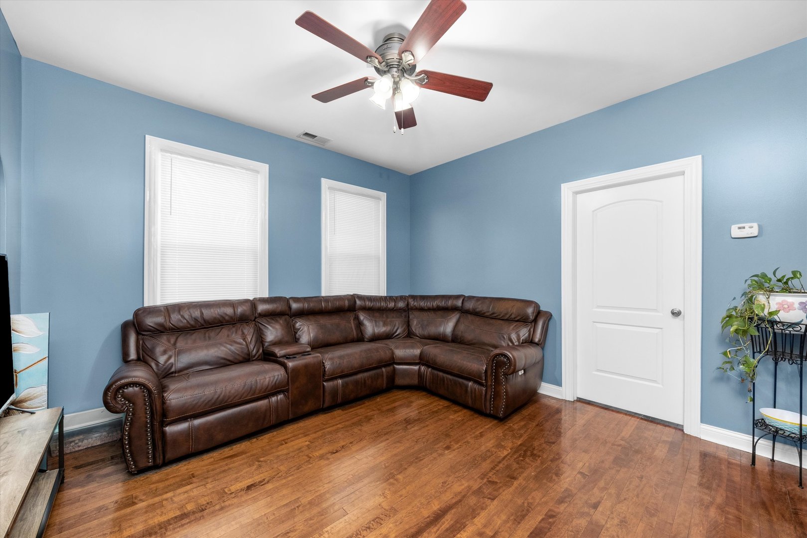 5108 West 24th Place, Unit 2 Cicero, IL 60804 - Photo 4 of 29 a living room with furniture and a ceiling fan