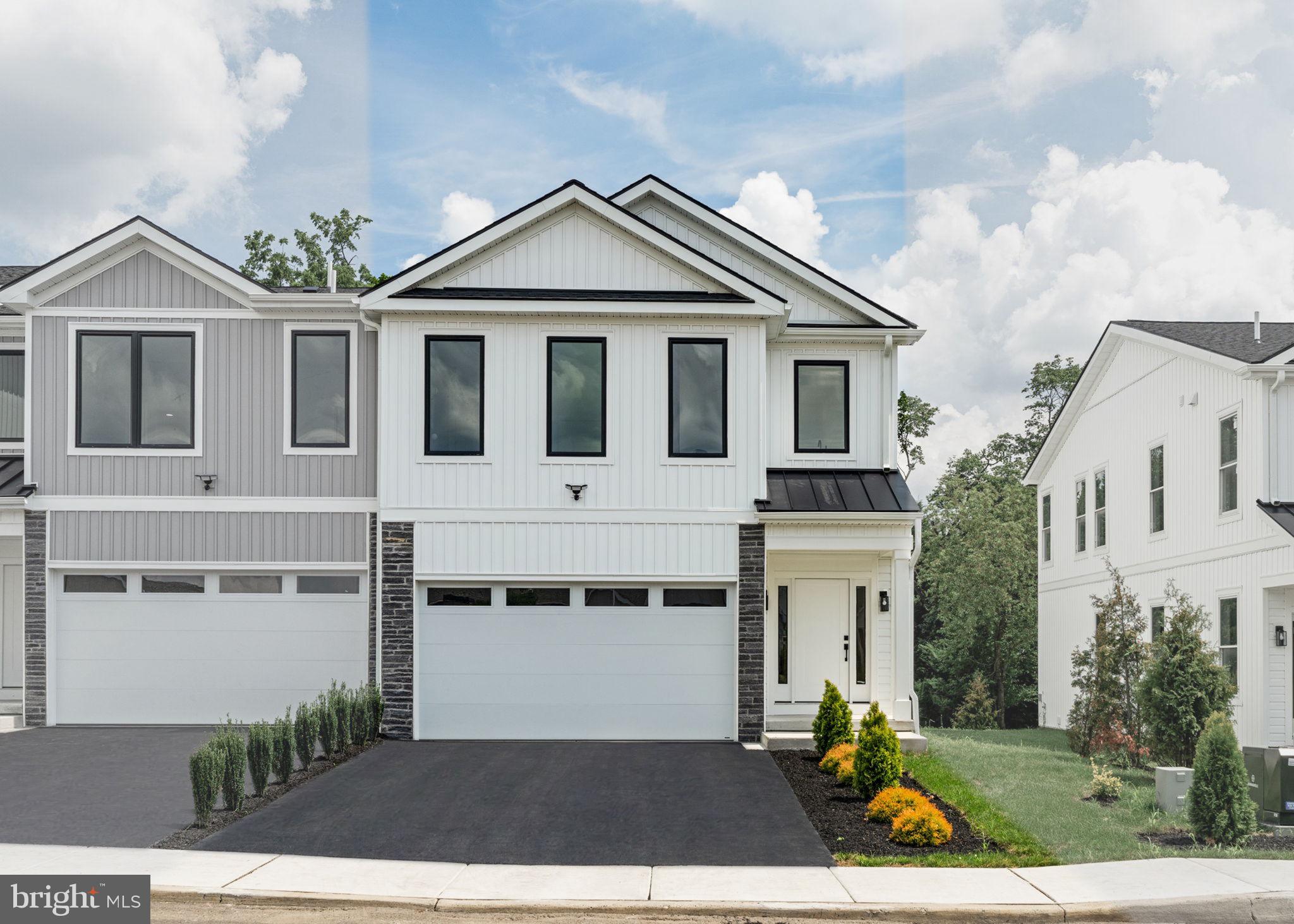 649 Provident Road Southampton, PA 18966 - Photo 2 of 36 a front view of a house with a yard and garage